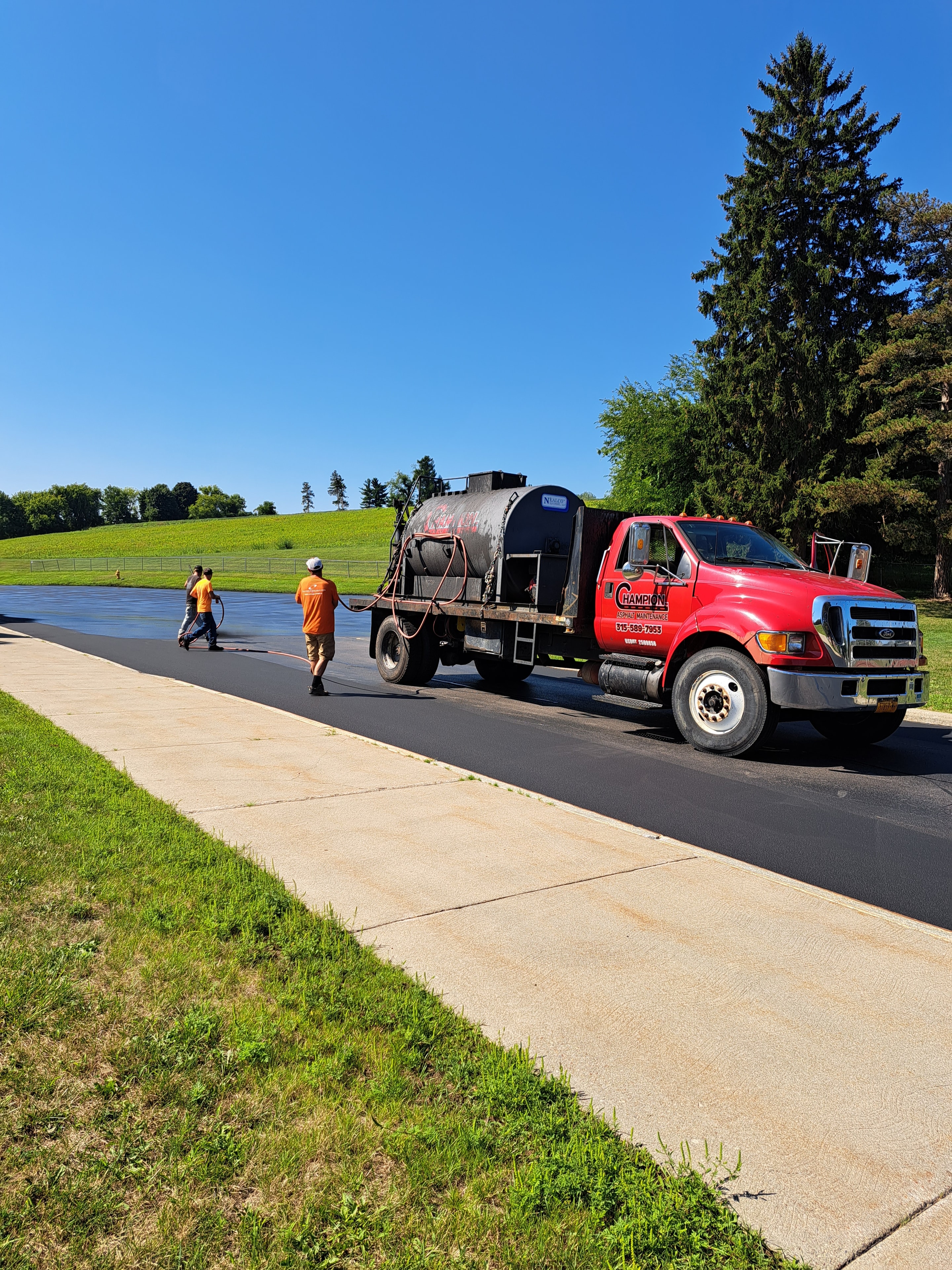 Freshly seal coated asphalt surface